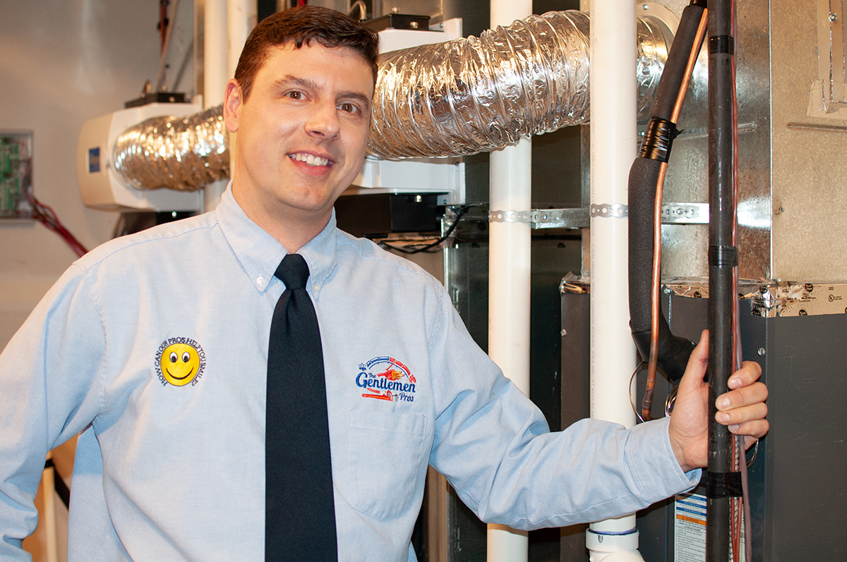 Technician performing a furnace inspection
