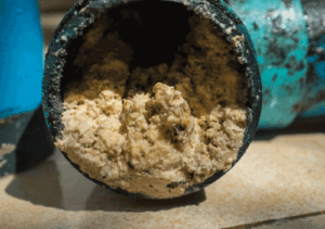 Plumbing Pipe Clog with Grease and Fat